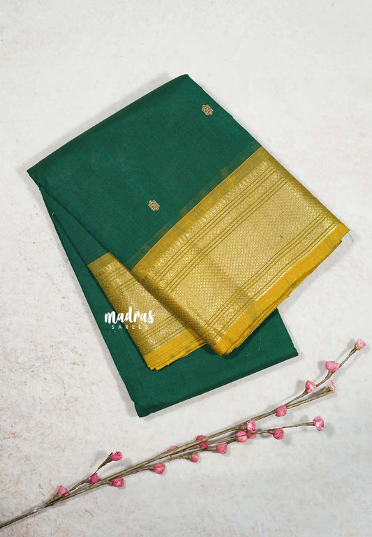 Classic Dark Green - Karthigai silk cotton Bavanji Border with Buttas in saree
