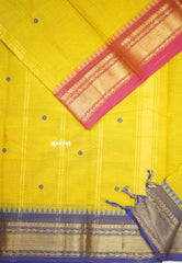 Karthigai silk cotton buttas with bavanji Ganga Jamuna border - Yellow