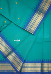 Karthigai silk cotton getti zari with floral border - Teal green