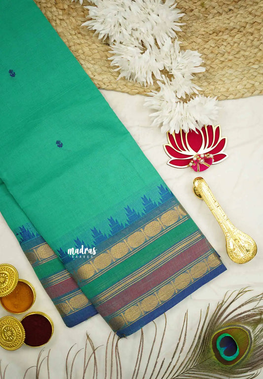 Karthigai silk cotton multicolor rudraksham border - Teal green