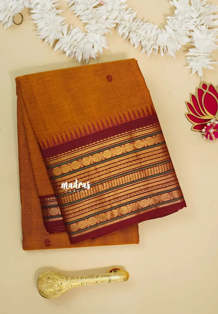Mustard yellow - Karthigai silk cotton  Multi Border Rudraksham with buttas