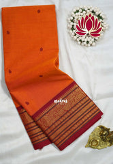 Sunset Orange - Karthigai silk cotton buttas with mango and floral border - Best for Wedding Functions