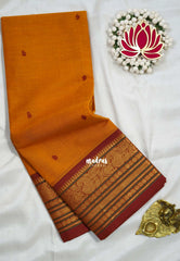 Turmeric Orange - Karthigai silk cotton buttas with mango and floral border - Best for Wedding Functions