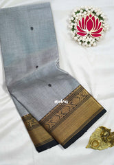 Pastel Grey - Karthigai silk cotton bavanji floral border with buttas - Best for Festive Wear | Temple Visit