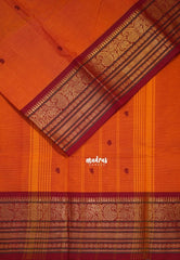 Sunset Orange - Karthigai silk cotton buttas with mango and floral border - Best for Wedding Functions