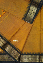 Mustard Yellow - Karthigai silk cotton plain body self rudraksham border