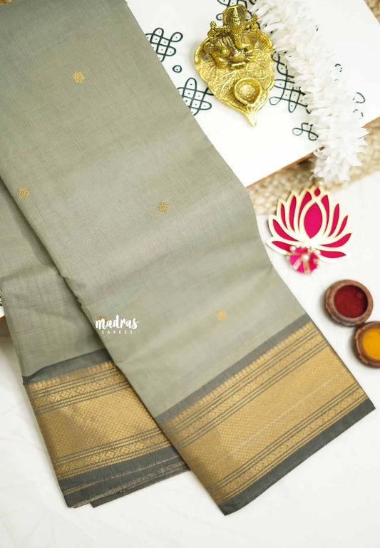 Karthigai silk cotton bavanji border with buttas - Pastel grey