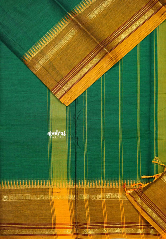 Green - Karthigai silk cotton plain body rudraksham skirt border