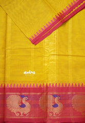 Turmeric Yellow - Karthigai silk cotton plain body with peacock border