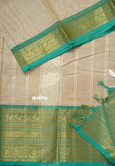 Beige - Karthigai silk cotton plain body traditional big border