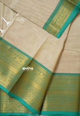 Beige - Karthigai silk cotton plain body traditional big border