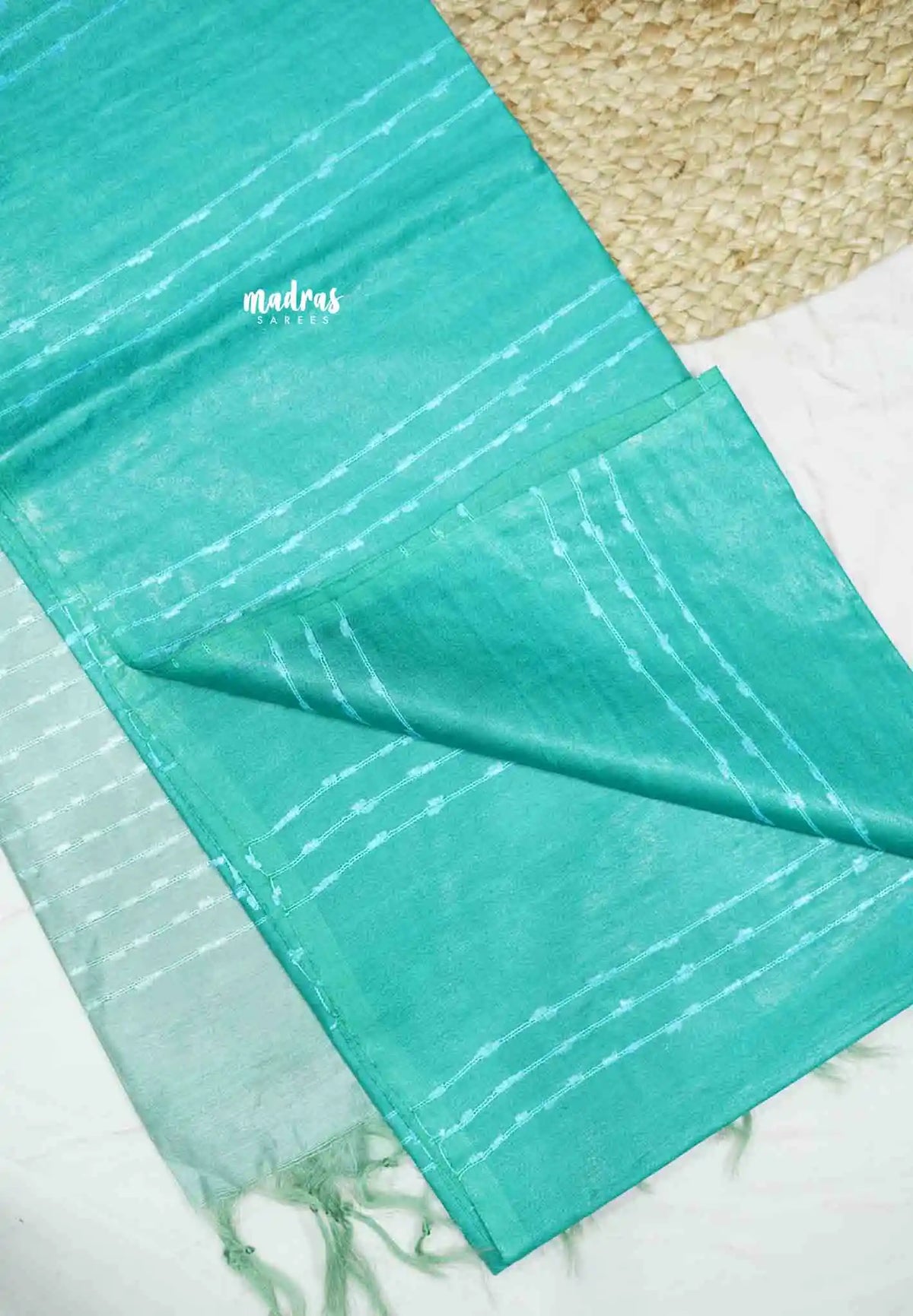 khadi silk contrast pallu with stripe design body - Teal green