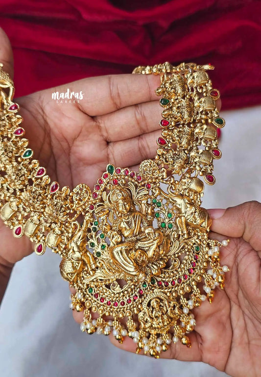 Traditional Lakshmi and mayil bridal Long Necklace / Haram in Matte Finish With Earrings