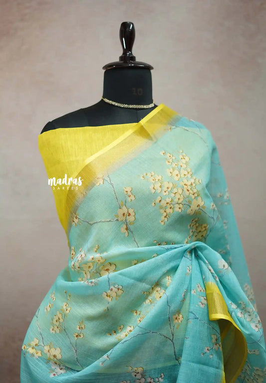 Losliya Inspired Soft Linen Cotton Saree with Aqua Blue & Floral Prints