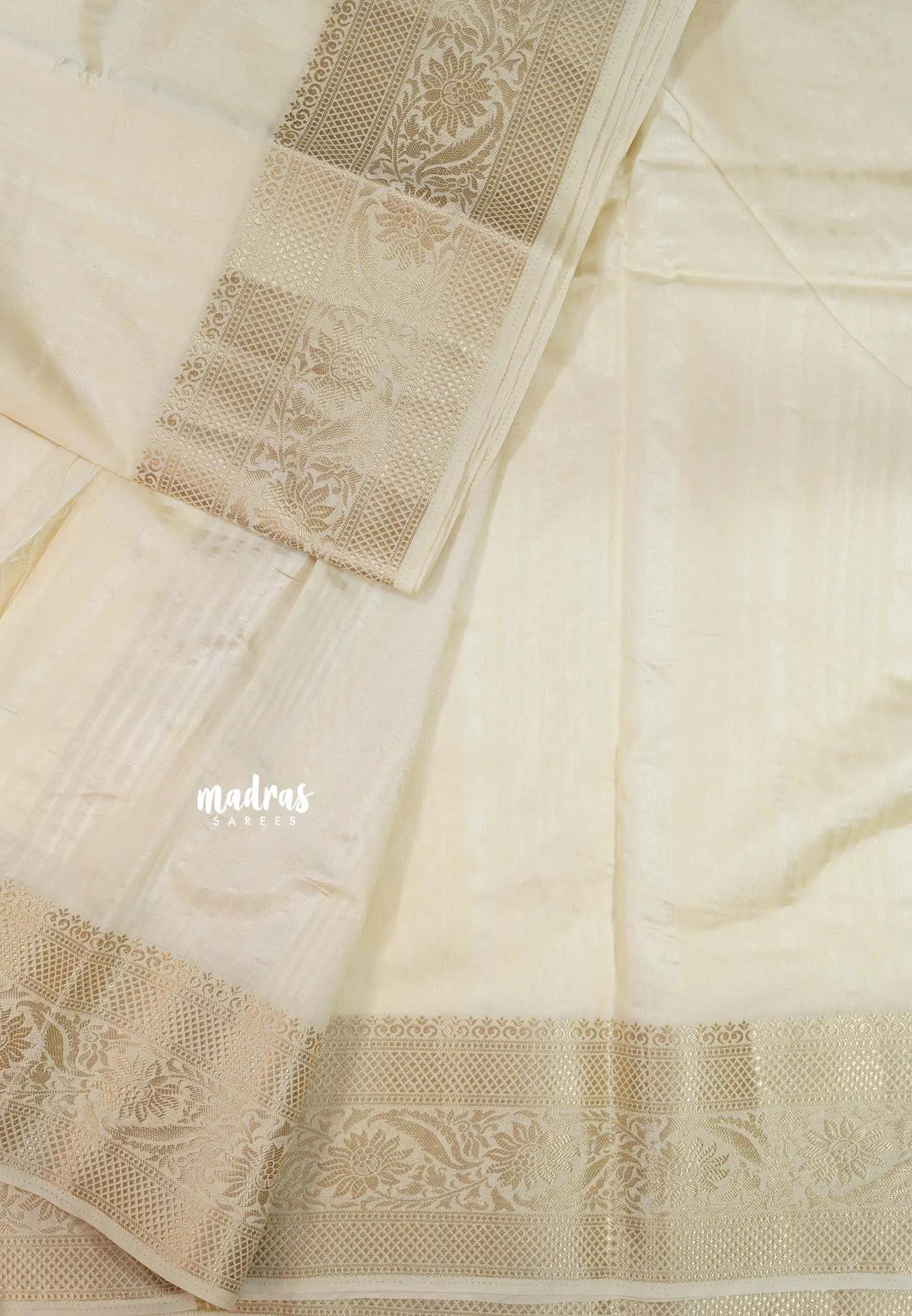 Ivory Cream - Madhuram - Soft Matka silk with grooves body with traditional border