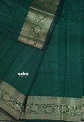 Dark Green - Madhuram - Soft Matka silk with grooves body with traditional border
