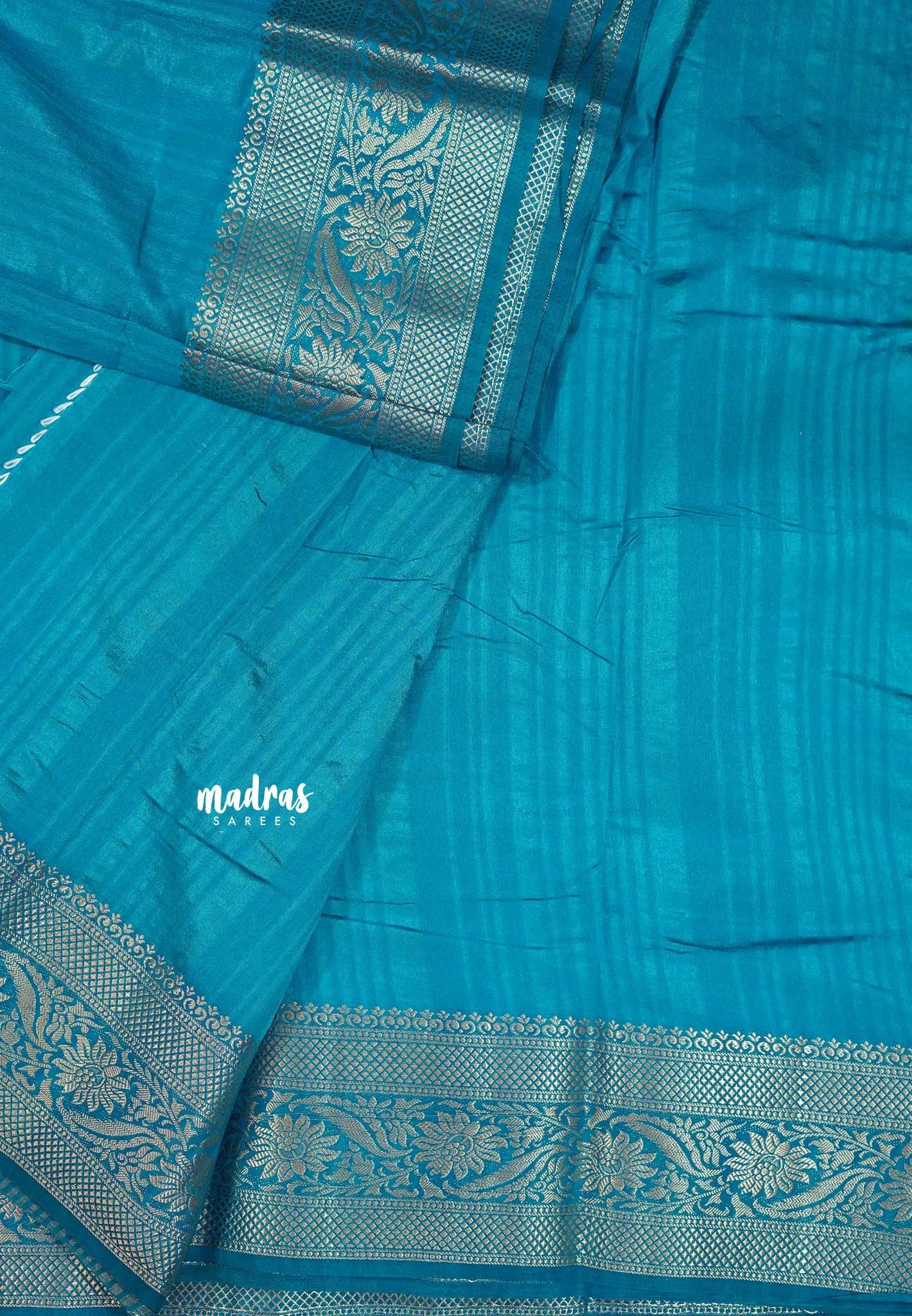 Teal Blue - Madhuram - Soft Matka silk with grooves body with traditional border