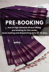 Purple saree with gold patterns on a light background, with text about pre-booking.