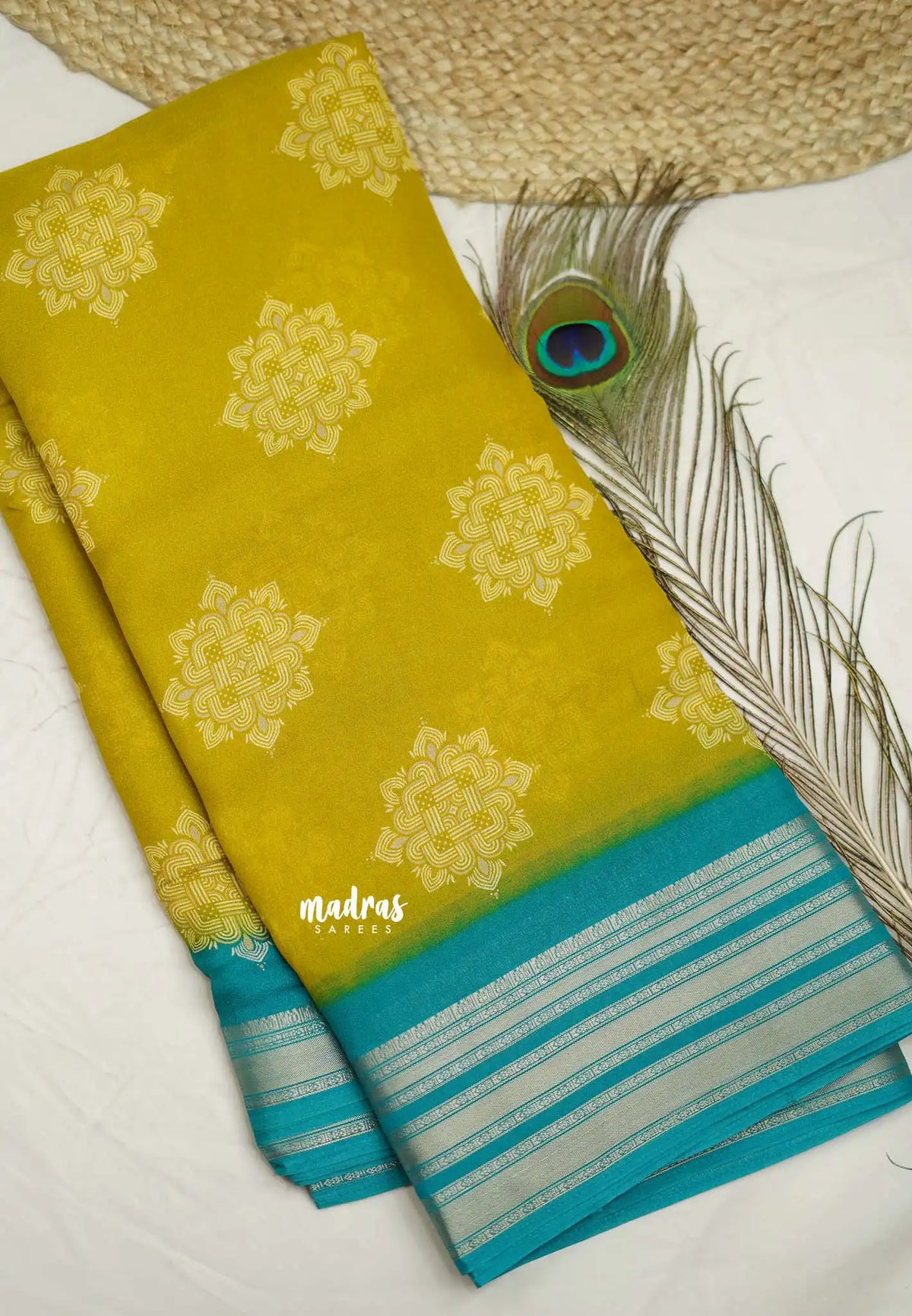 Silky Georgette with rangoli buttas - Yellow with cyan blue