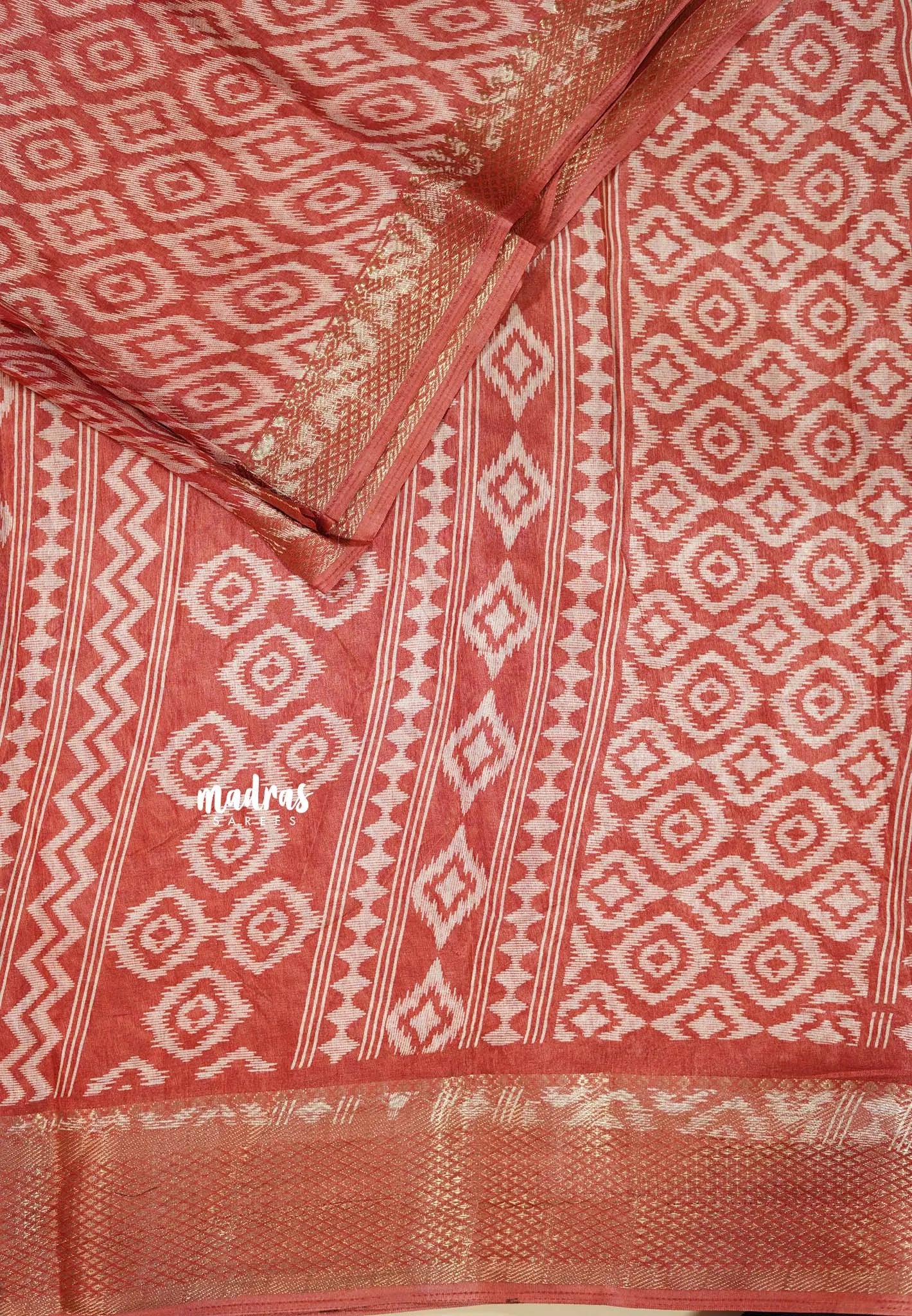 Muted Brick Red - Silky Georgette with Ikkat Prints and Zari Border