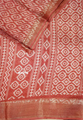 Muted Brick Red - Silky Georgette with Ikkat Prints and Zari Border