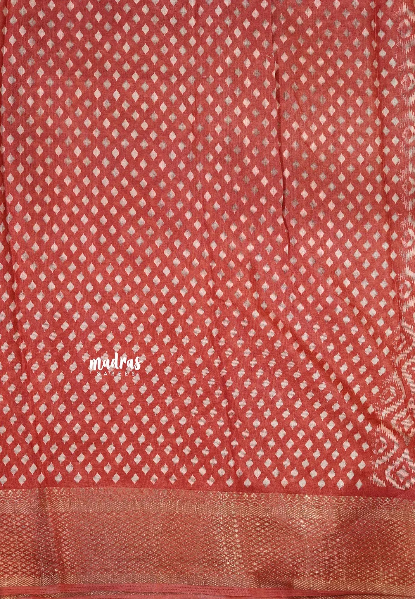 Muted Brick Red - Silky Georgette with Ikkat Prints and Zari Border