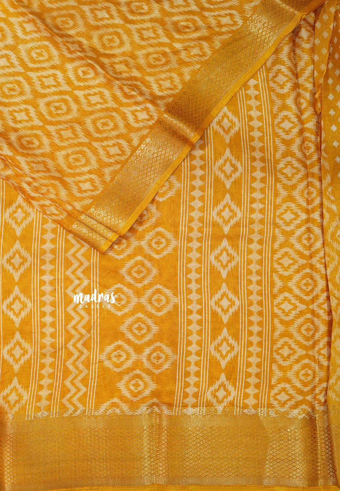 Turmeric Yellow - Silky Georgette with Ikkat Prints and Zari Border