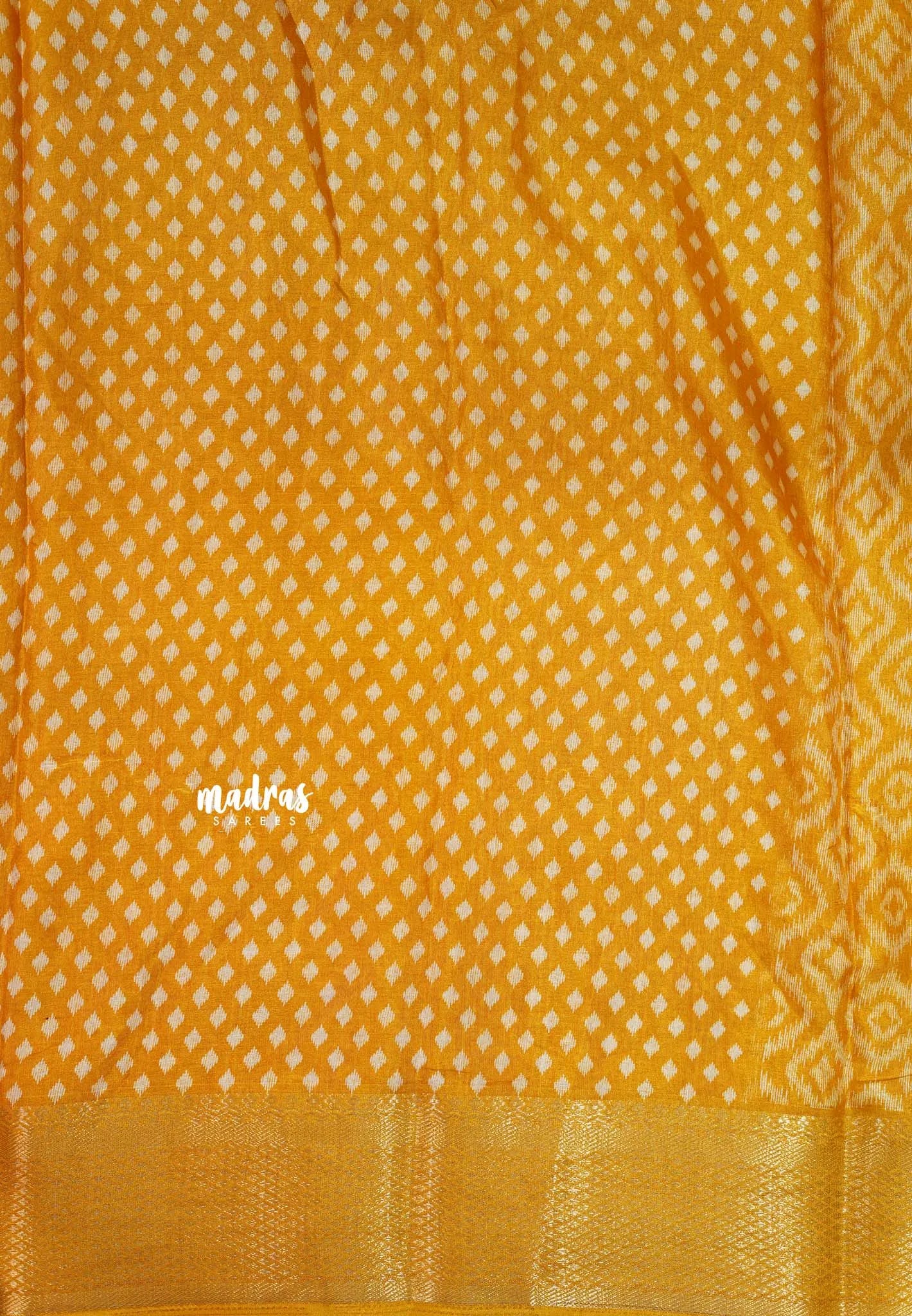 Turmeric Yellow - Silky Georgette with Ikkat Prints and Zari Border