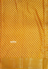 Turmeric Yellow - Silky Georgette with Ikkat Prints and Zari Border