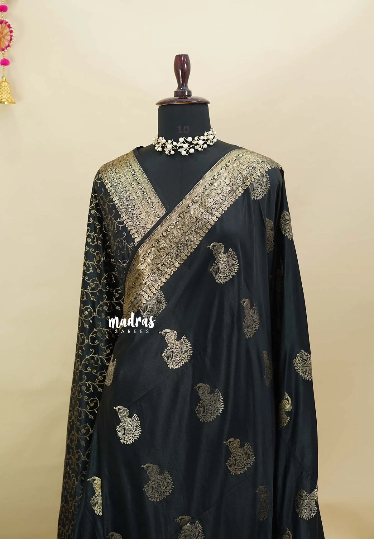 Black Pearl - Sri valli pure satin silk with peacock buttas and gold zari border