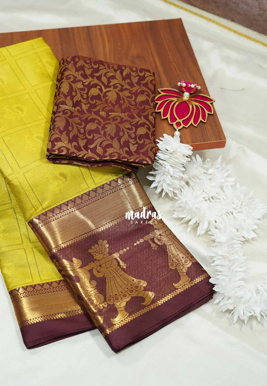 Greenish yellow - Thendral - Kanchi semi silk with thread weaving body pallaku border
