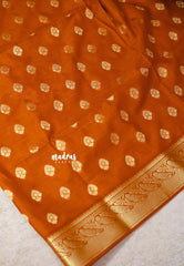 Tangerine Orange - Vadhanam - Premium Jute Tussar silk with buttas and gold zari border