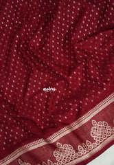 Crimson Maroon - Vadhanam - Jute Tussar Silk Saree Small Thilagam Buttas with Tissue Weaving Kolam Border - Perfect for Diwali Festive