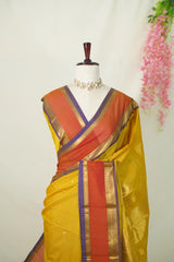 Dual shade Golden Turmeric Yellow - Vaibhogam 120 count Pure mercerized silk cotton with buttas and rettapet border