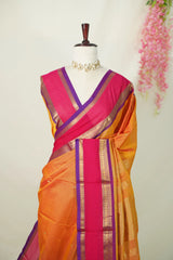 Dual shade Pumpkin Orange - Vaibhogam 120 count Pure mercerized silk cotton with buttas and rettapet border