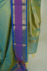 Dual shade Pista Green - Vaibhogam 120 count Pure mercerized silk cotton with buttas and rettapet border