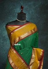 Green - vaibhogam 120 count Pure mercerized silk cotton with buttas and rettapet border