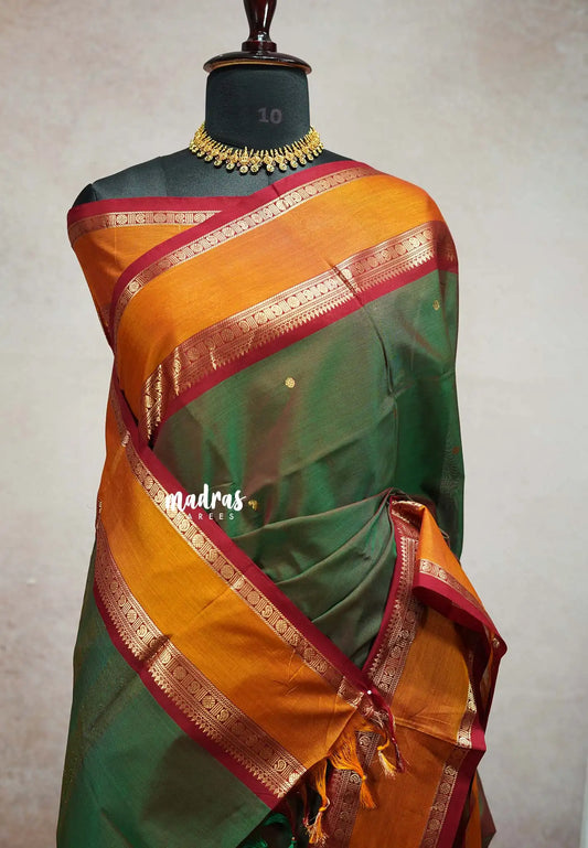 Dual shade Olive Green - vaibhogam 120 count Pure mercerized silk cotton with buttas and rettapet border