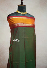 Dual shade Olive Green - vaibhogam 120 count Pure mercerized silk cotton with buttas and rettapet border