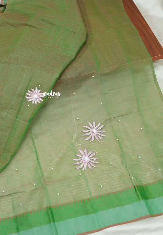 Peach-pink khadi cotton Saree with Green floral Embroidered Blouse