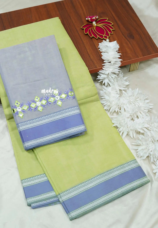 Elegant green khadi cotton Saree with blue-grey Embroidered Blouse